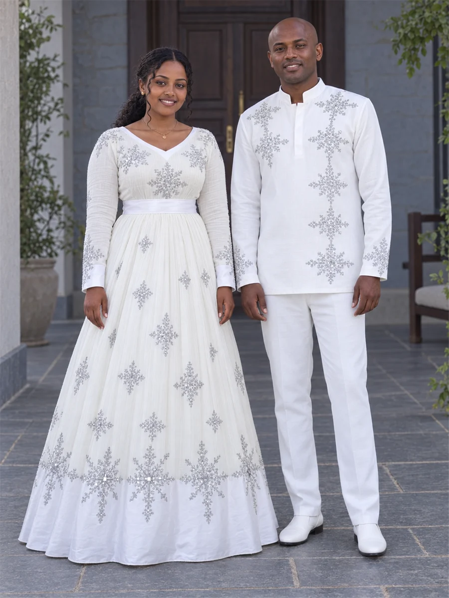 Ivory Medallion Pair የሀበሻ ልብስ